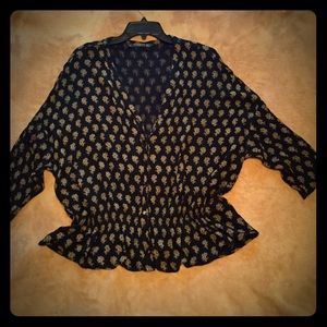 Zara loose-fitting blouse.